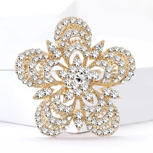 Broche fleur dorée élégante avec cristaux scintillants et strass blanc central