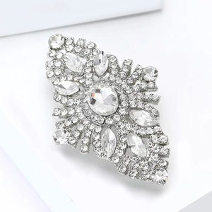 Detailed view of silver-tone alloy brooch featuring brilliant marquise cut rhinestones