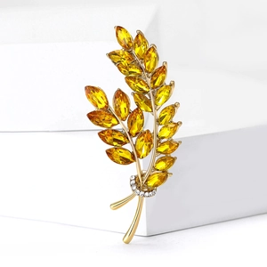 Broche épi de blé dorée avec pierres scintillantes et détails fins en micro-pavage