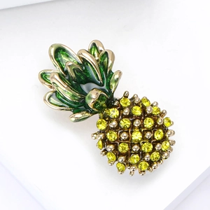 Creative pineapple brooch with yellow rhinestones and green enamel on a golden base
