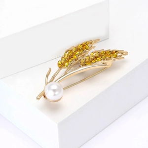 Broche élégante en forme d'épi de blé doré avec cristaux jaunes et perle blanche