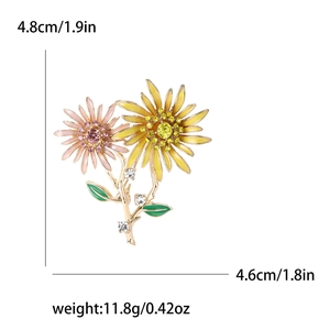 Broche tournesol en alliage avec émail et cristaux, dimensions 4,8cm x 4,6cm
