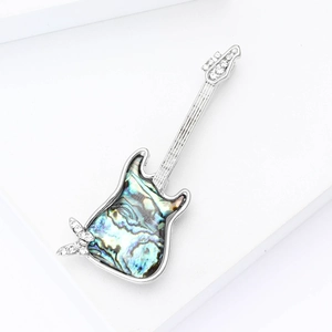Exquisite silver guitar brooch with colorful abalone shell inlay and sparkling rhinestones