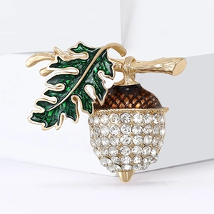 Elegant gold acorn brooch with green enamel leaf and sparkling crystal rhinestones