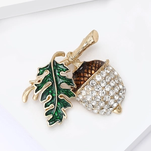 Elegant acorn brooch pin with green enamel leaf and sparkling rhinestones on gold base