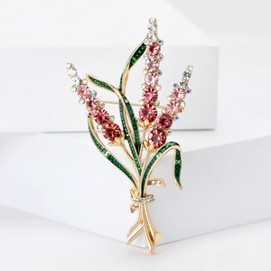 Broche élégante en bouquet de blé avec strass roses et rouges sur alliage doré