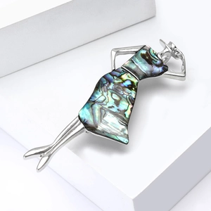 Elegant silver woman brooch with natural colorful abalone shell dress in a modern style