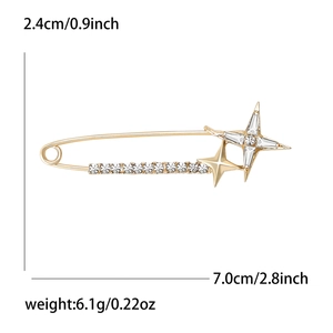 Elegant gold star pin brooch with cubic zirconia crystals and sparkling star design