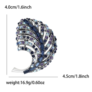 Elegant silver feather brooch with blue rhinestones and dimensions showing 4.5cm width