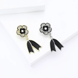 Elegant camellia flower drop earrings with rhinestones and black ribbons in gold and silver