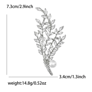 Elegant willow branch brooch with sparkling rhinestones and white pearl on silver base
