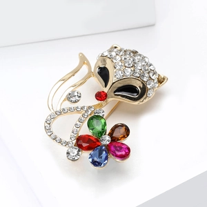 Spilla a forma di volpe dorata con strass colorati e dettagli floreali in cristallo