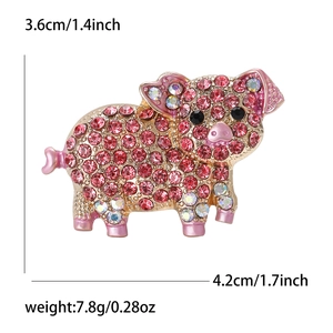 Cute pink rhinestone pig brooch in gold alloy finish with dimensions and weight