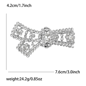Detail showing dimensions and weight of silver bow brooch with sparkling rhinestones