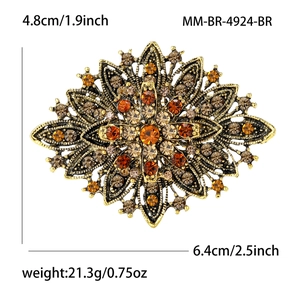 Luxurious vintage sunburst brooch with amber rhinestones and gold alloy base in 6.4x4.8cm size