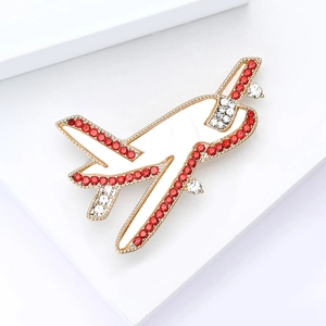Exquisite gold alloy airplane brooch with rhinestones and white enamel finish