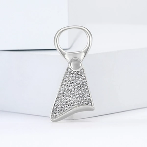 Elegant silver alloy necktie brooch with sparkling rhinestones on a minimalist white stand