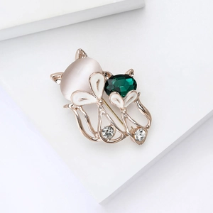 Classic rose gold fox brooch with pink opal cat eye stone and green crystal accents