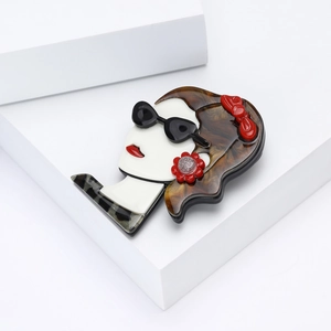 Cartoon acrylic brooch featuring a girl with sunglasses and leopard print hair