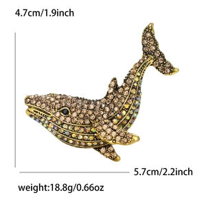Detail view showing dimensions of whale brooch with champagne rhinestones and gold alloy