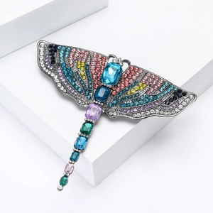 Elegant colorful rhinestone dragonfly brooch with sparkling crystals on dark alloy base