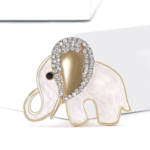 Elegant gold elephant brooch with white marble texture and sparkling crystals for women