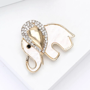 Elegant gold elephant brooch with white shell inlay and sparkling rhinestones for women
