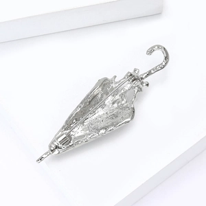 Detailed back view of silver alloy umbrella brooch showing the secure pin clasp closure