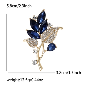 Broche fleur d'orchidée dorée avec cristaux bleus et strass blancs, taille de 5,8 cm