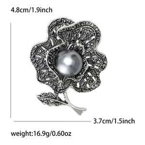 Vintage gunmetal floral brooch with grey faux pearl and rhinestones, 4.8cm x 3.7cm