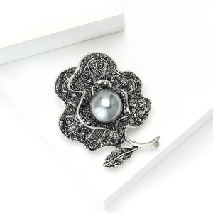 Vintage gunmetal floral brooch with dark grey pearl and sparkling marcasite stones