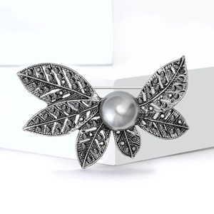 Broche vintage en forme de feuille avec perle grise et strass en argent antique