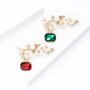 Elegant plum blossom bonsai brooches with vibrant red and green rectangular gemstones