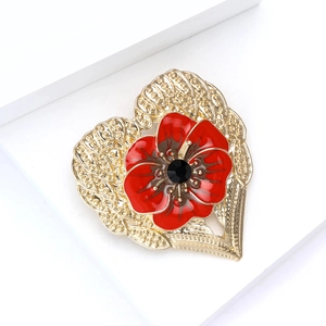 Exquisite gold heart brooch with red enamel poppy flower and black faceted crystal inlay