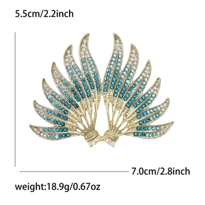 Elegant wing-shaped rhinestone brooch in blue and silver gradient with 7.0cm gold base