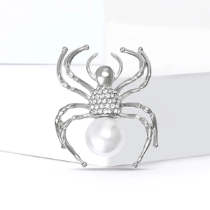 Elegant silver spider brooch with white pearl and sparkling rhinestones for formal attire