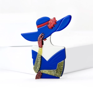 Acrylic Marilyn Monroe brooch in blue vintage dress with red maple leaf hat details