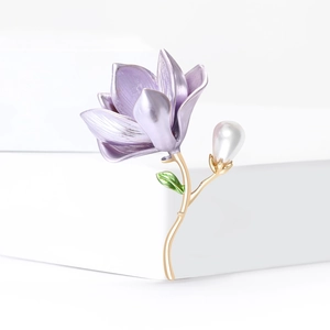 Elegant purple magnolia flower brooch with gold plating and a white teardrop pearl detail