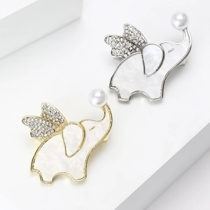 Elegant elephant brooch with natural shell, rhinestones and white pearl in gold and silver
