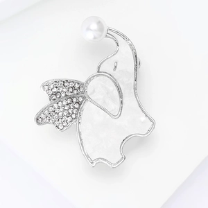 Detailed close-up of elephant brooch with pearl accent and cubic zirconia inlays