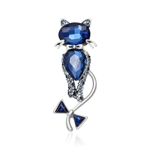 Elegant cat brooch with deep blue faceted crystals and silver-tone sparkling accents