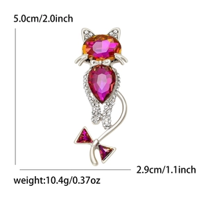 Pink gemstone cat brooch for women with sparkling zircons and a small bow detail