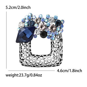 Vintage hollow square crystal brooch with blue stones, sized 5.2cm x 4.6cm