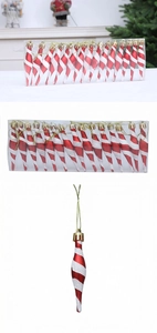 Detail of red and white spiral Christmas ornaments with gold strings in box packaging