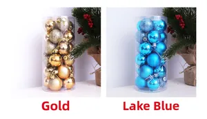 Detail of gold and lake blue Christmas ball ornaments in matte and glitter finishes