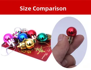 Size comparison of 2cm mini colorful Christmas baubles with hanging loops for trees