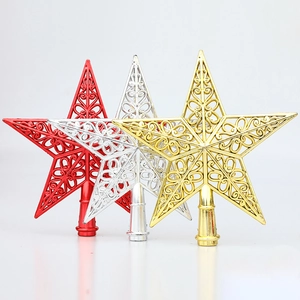 Hollow star Christmas tree topper in red, silver and gold with scroll pattern finish