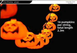 Detail of 16 LED pumpkin string lights for Halloween decoration glowing in the dark