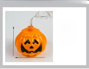 Detail of Halloween pumpkin string lights with 5cm by 6cm orange LED lanterns