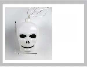 Detailed view of a 6x4cm white skull LED string light head for Halloween decor